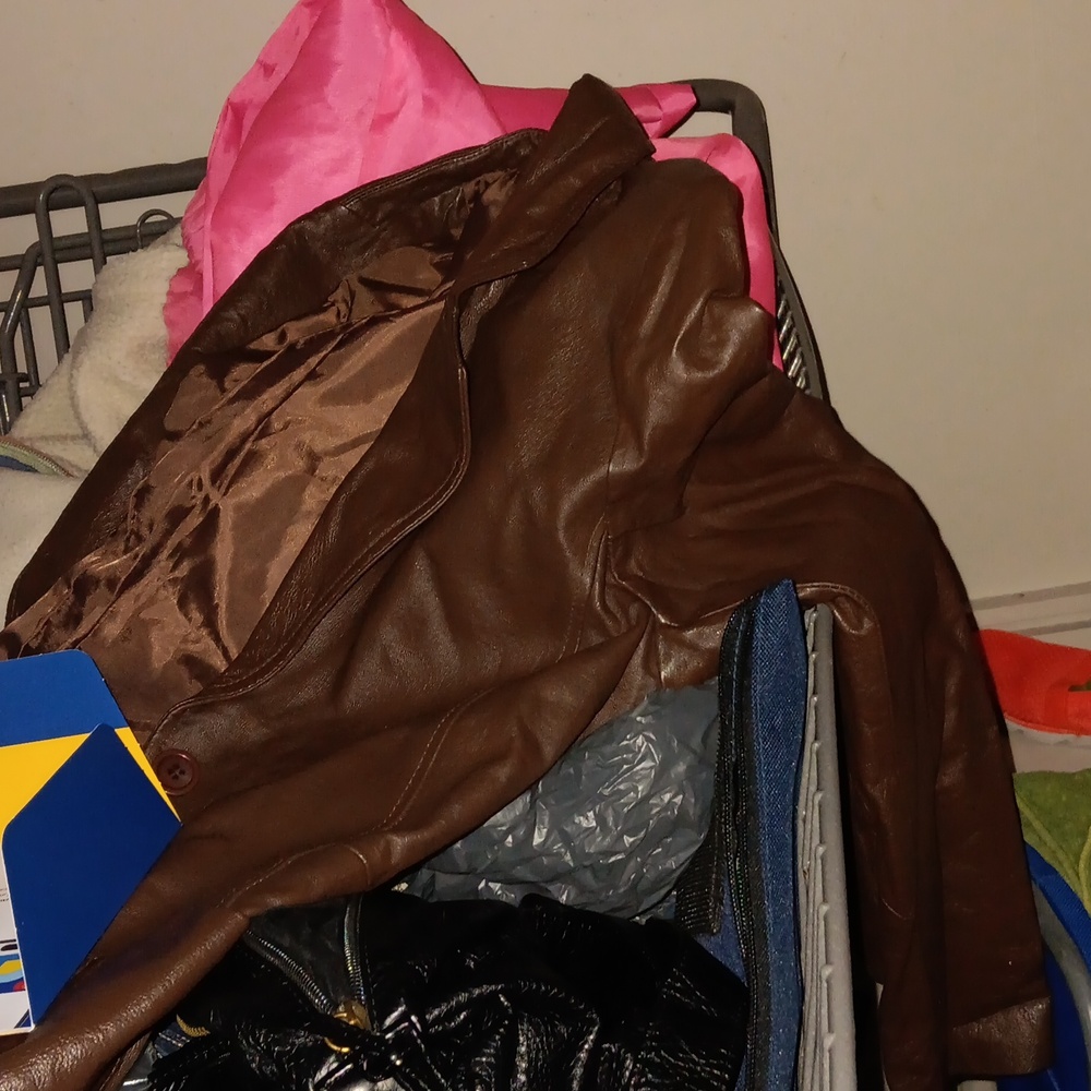 It is a size 8 women's leather jacket from Metro Style and it is Brown